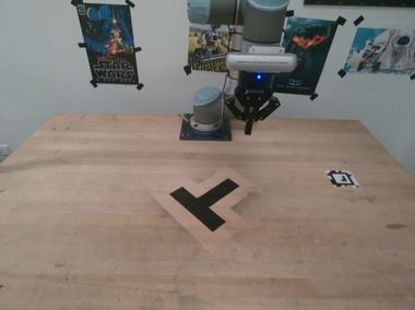 Sample frame from the ur_rss capture session, same desk with different Star Wars and Wall-E posters.