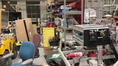 Sample frame from the benchmark_highbay capture session, a completely different warehouse environment with a different robot platform.
